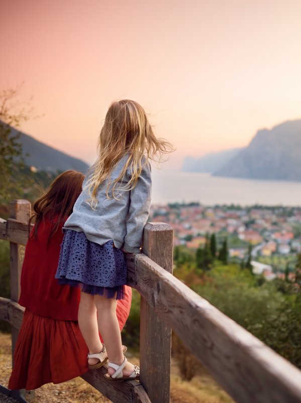 Two Girls Overlooking Lake Garda Family Travel